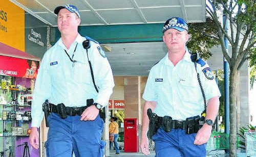 Warwick Police Constables Scott Hill and Grant Prendergast patrol Warwick’s CBD yesterday. Warwick Police Constables Scott Hill and Grant Prendergast patrol Warwick’s CBD yesterday.